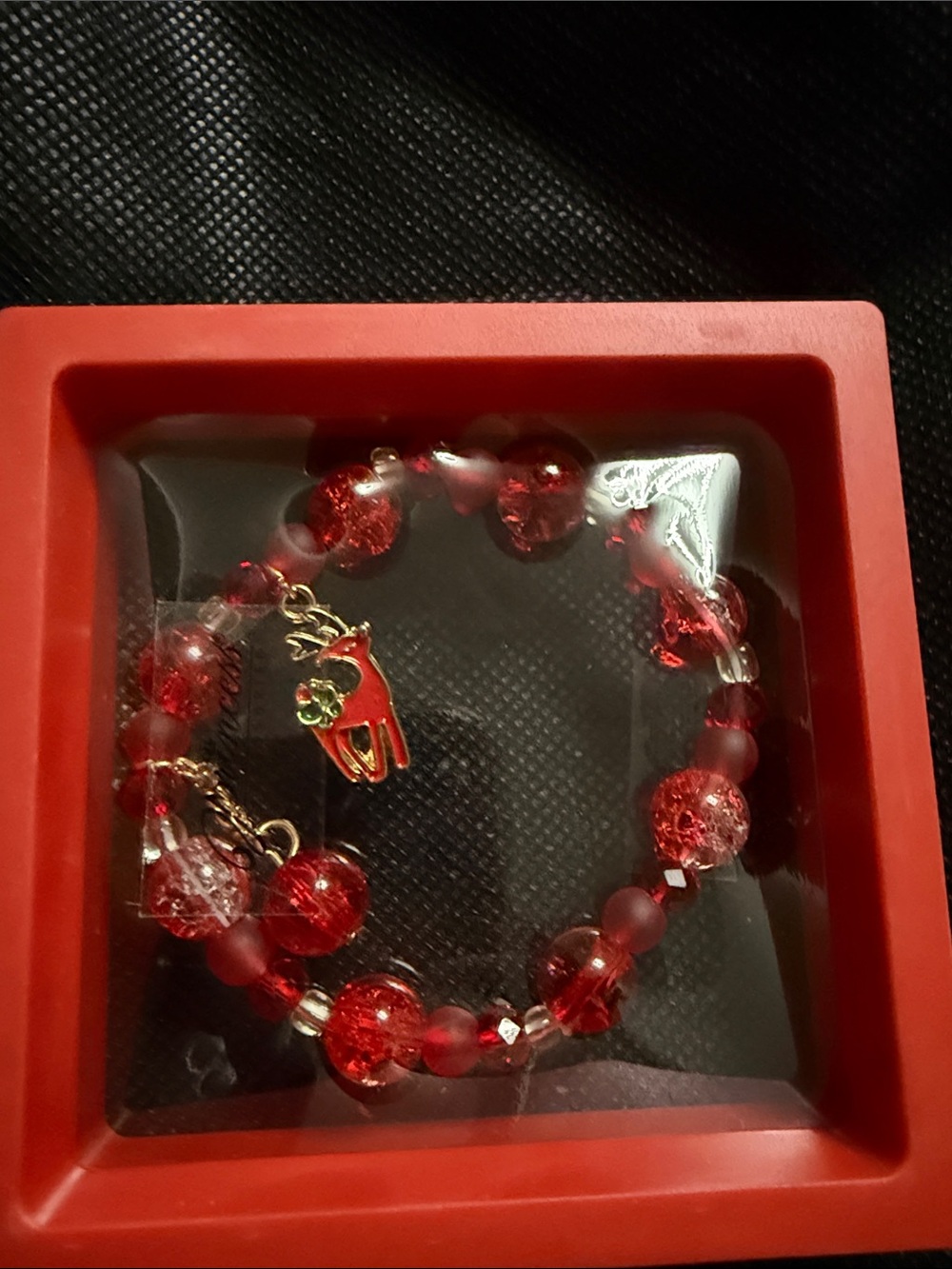 Festive Red Beaded Charm Bracelet with Reindeer Accent
